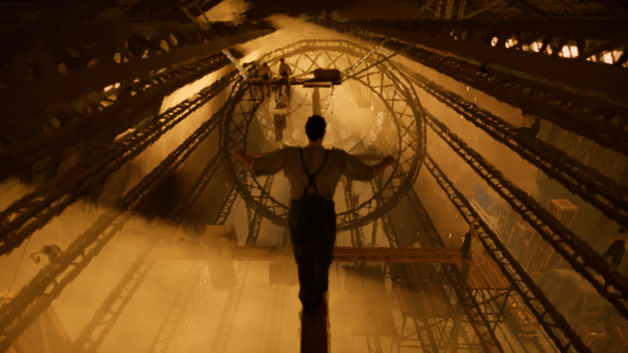 Ein Mann geht über einen Balken in einer Zeppelinfabrik.