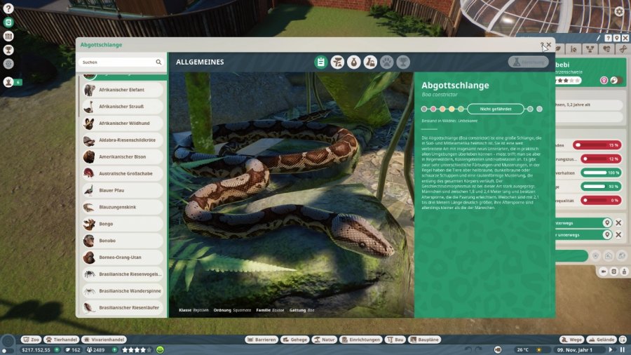 Geöffnete Enzyklopädie mit der Darstellung einer Schlange, ihrem Gefährdungsstatus und weiteren Hintergrundinformationen.